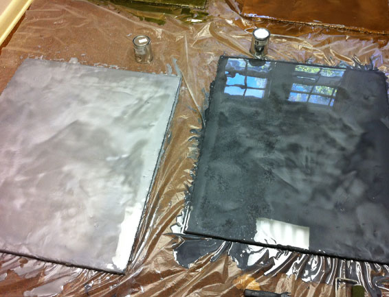 This image shows an epoxy paint sample that is color gray and black.